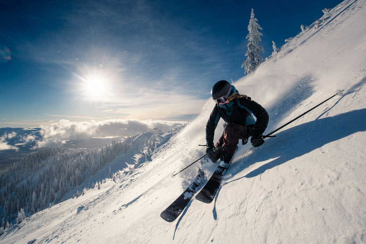 female skier on ski slope, At What Age Should You Stop Skiing?