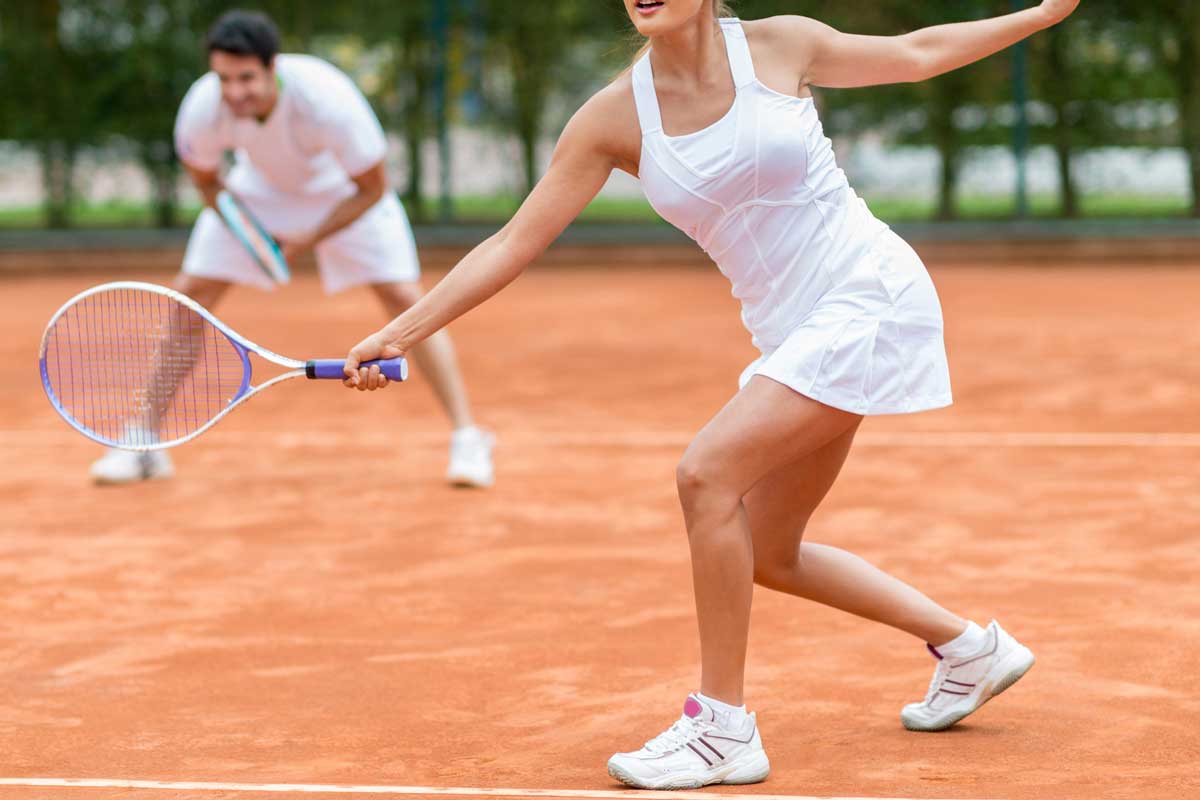 Couple playing doubles at tennis - outdoors sports, Are Tennis Shoes Non-slip?