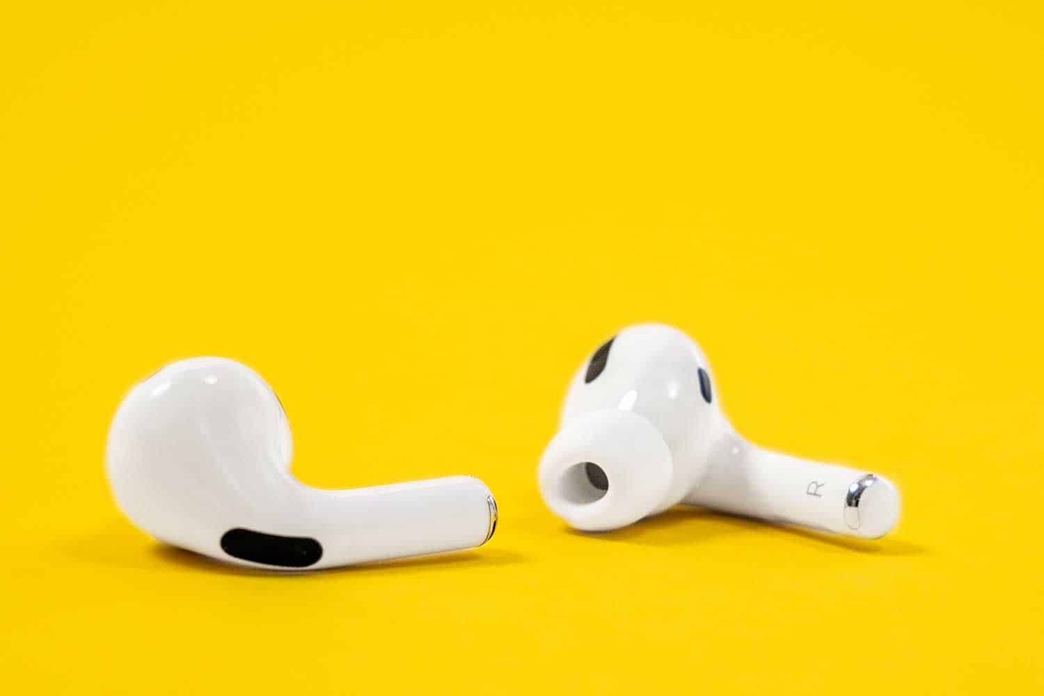 Apple AirPods Pro on a yellow background