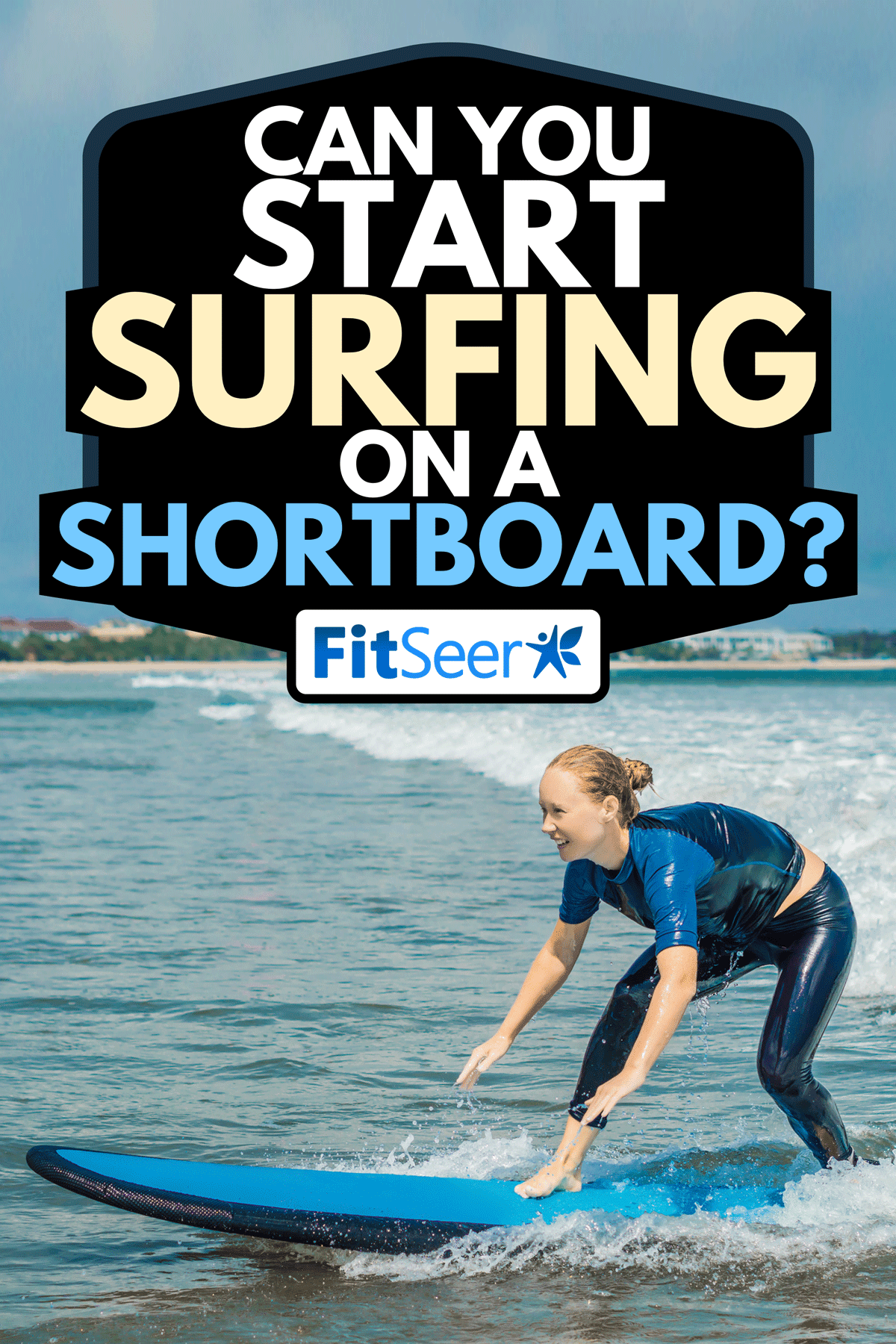 A young woman beginner surfer with blue surfboard having fun on small waves, Can You Start Surfing On A Shortboard?