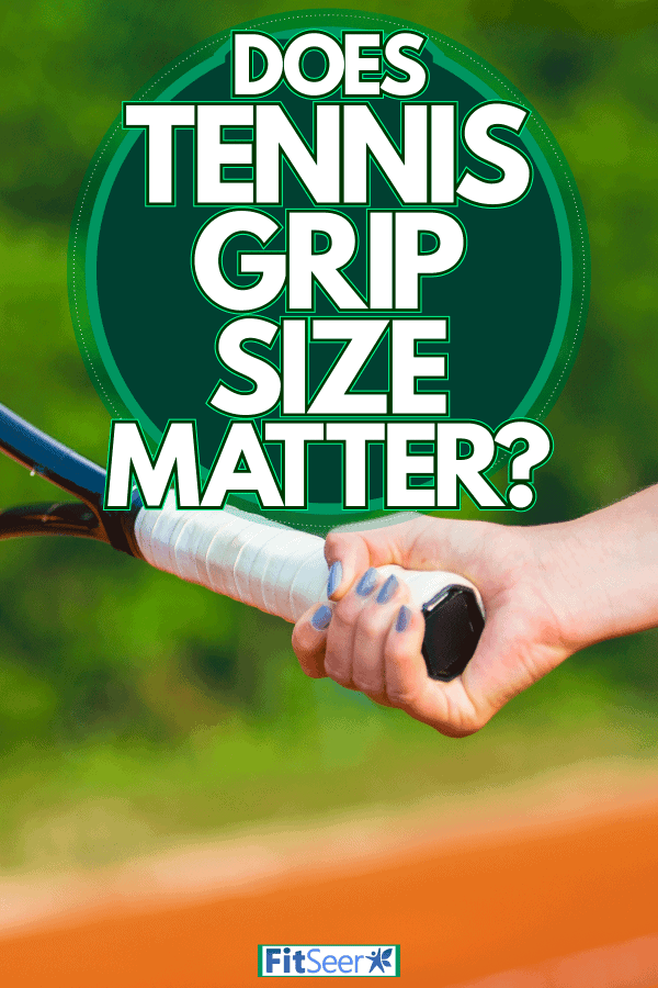 A woman holding a tennis racket tightly, Does Tennis Grip Size Matter?