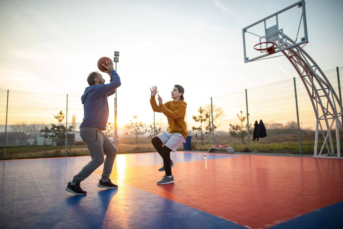 Father and Son playing basketball