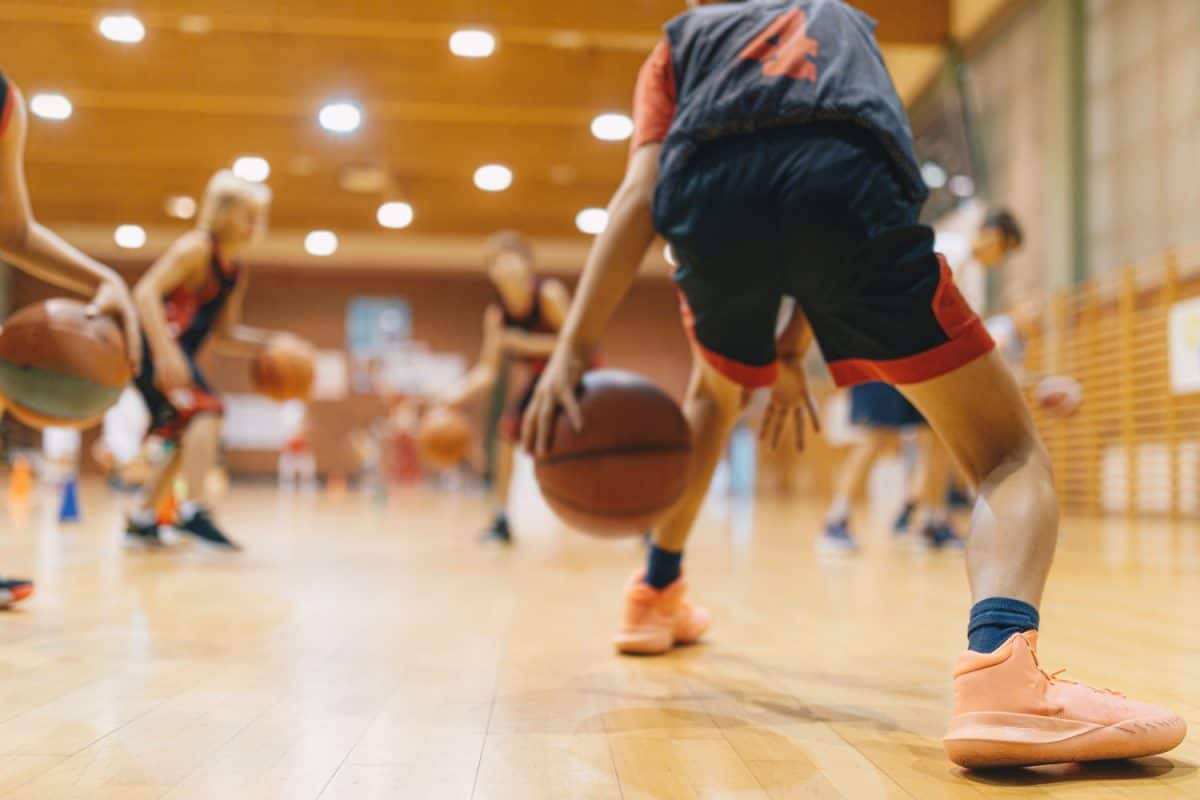 Basketball players playing photographed on an off focused