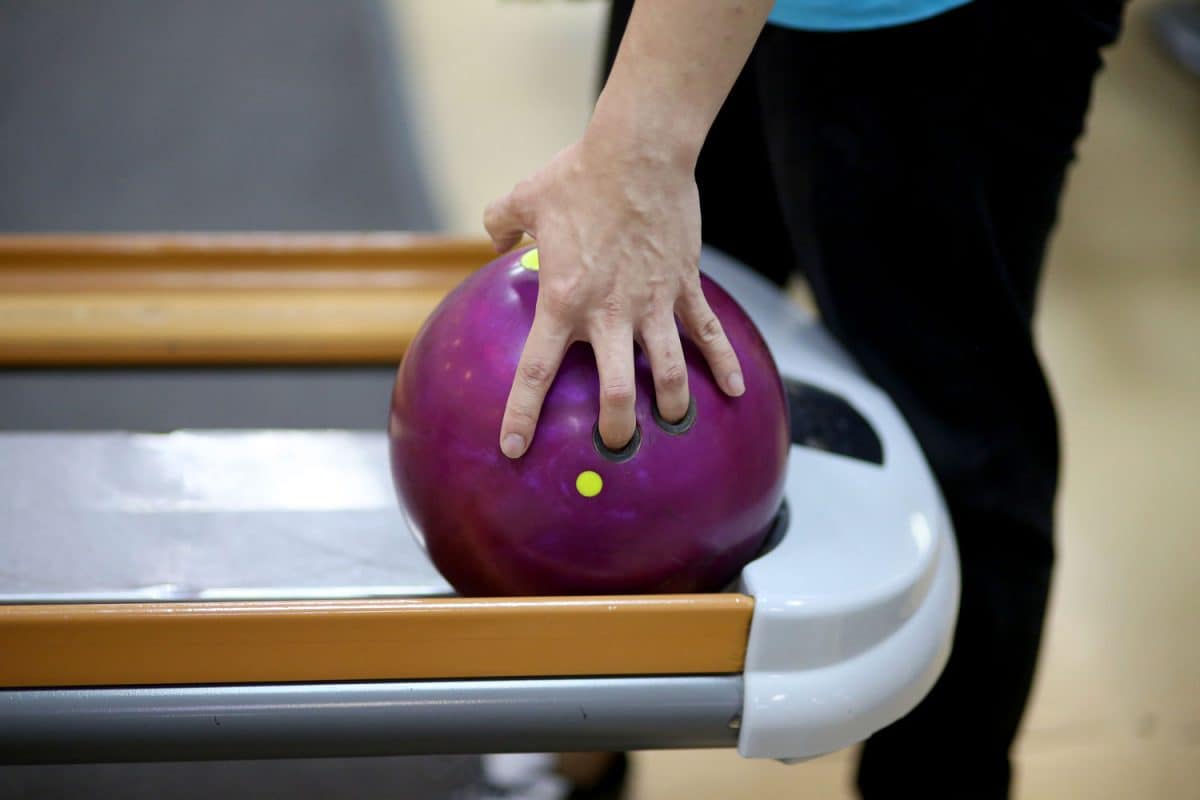 Bowling player preparing to throw his bowling ball