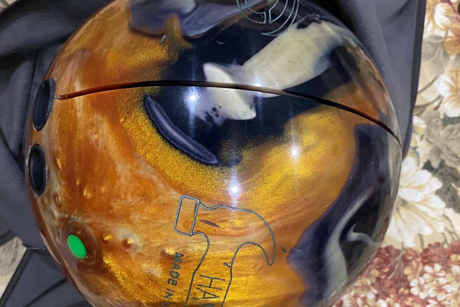 Bowling ball. Crack due to long period kept in store.